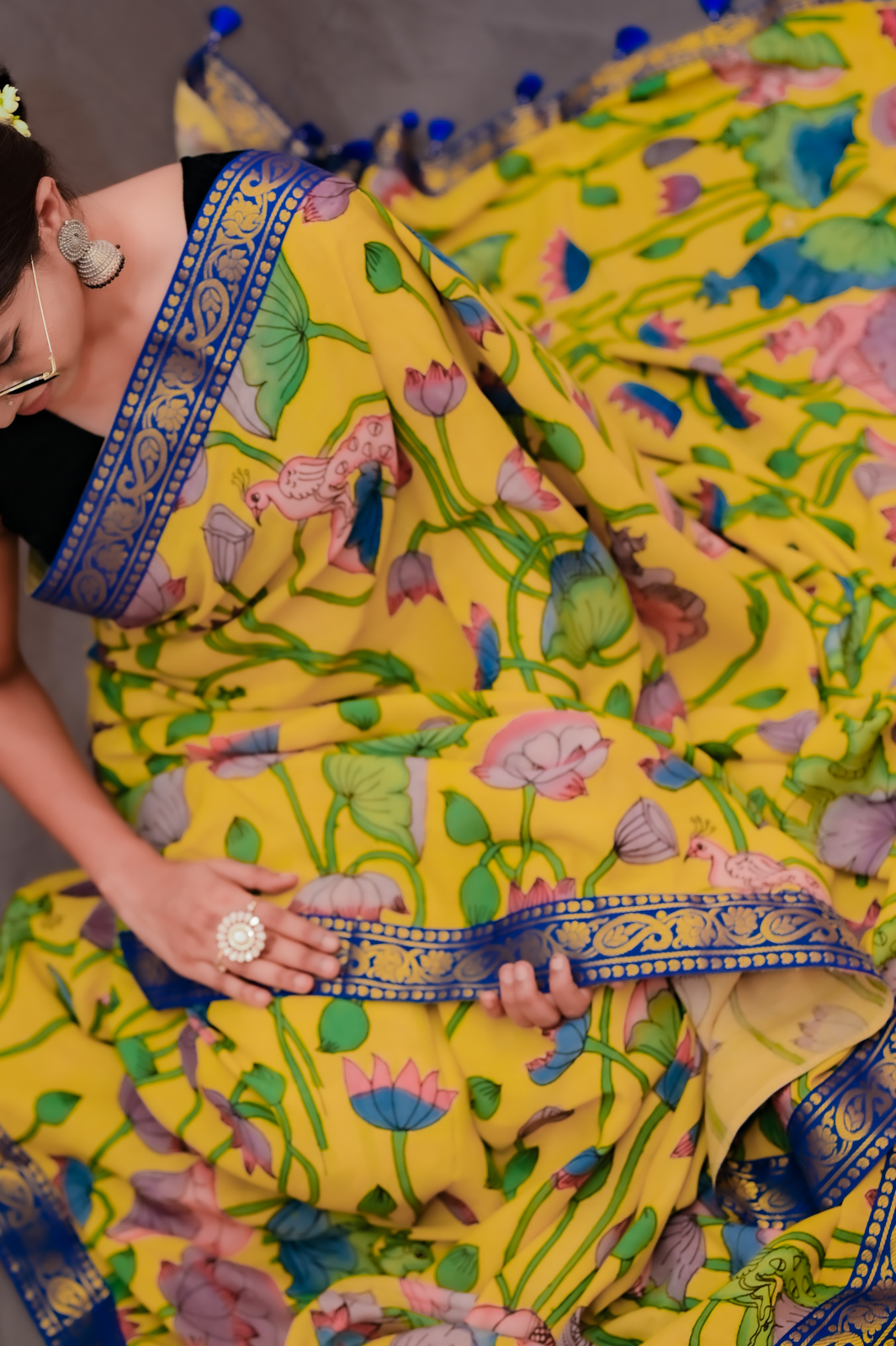Woman in traditional Kalamkari saree